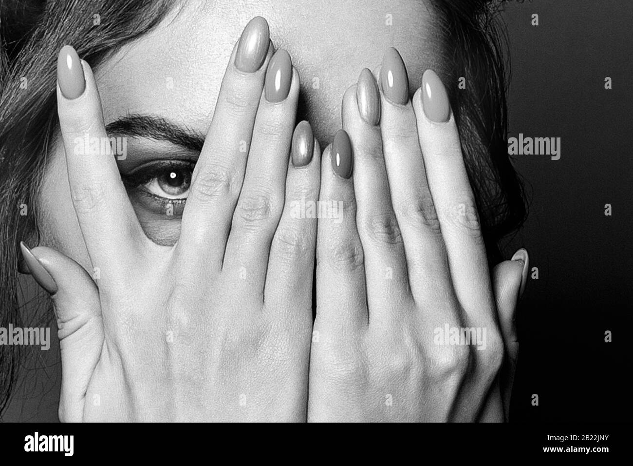Closeup face with hands, black and white portrait Stock Photo - Alamy