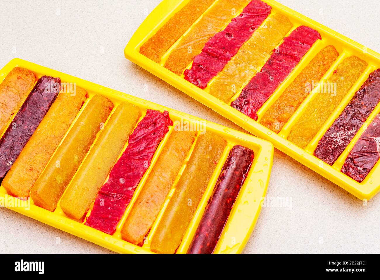 Stick Puree Frozen assortment of fruit purees in the form of sticks. Summer healthy ...