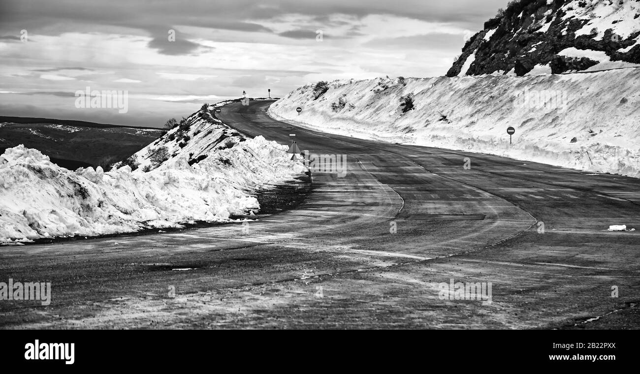 Ice and snow on the road, December and danger, travel Stock Photo