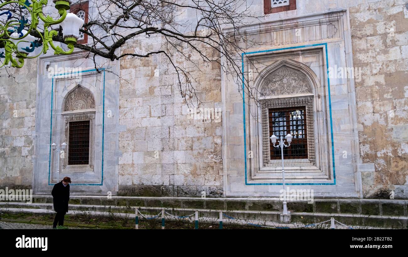 Bursa/ Turkey - 02/16/2020: Historic Gazi Orhan Mosque, 14th century ottoman architecture, the mosque was built in 1339. Exterior view from mosque. Bu Stock Photo
