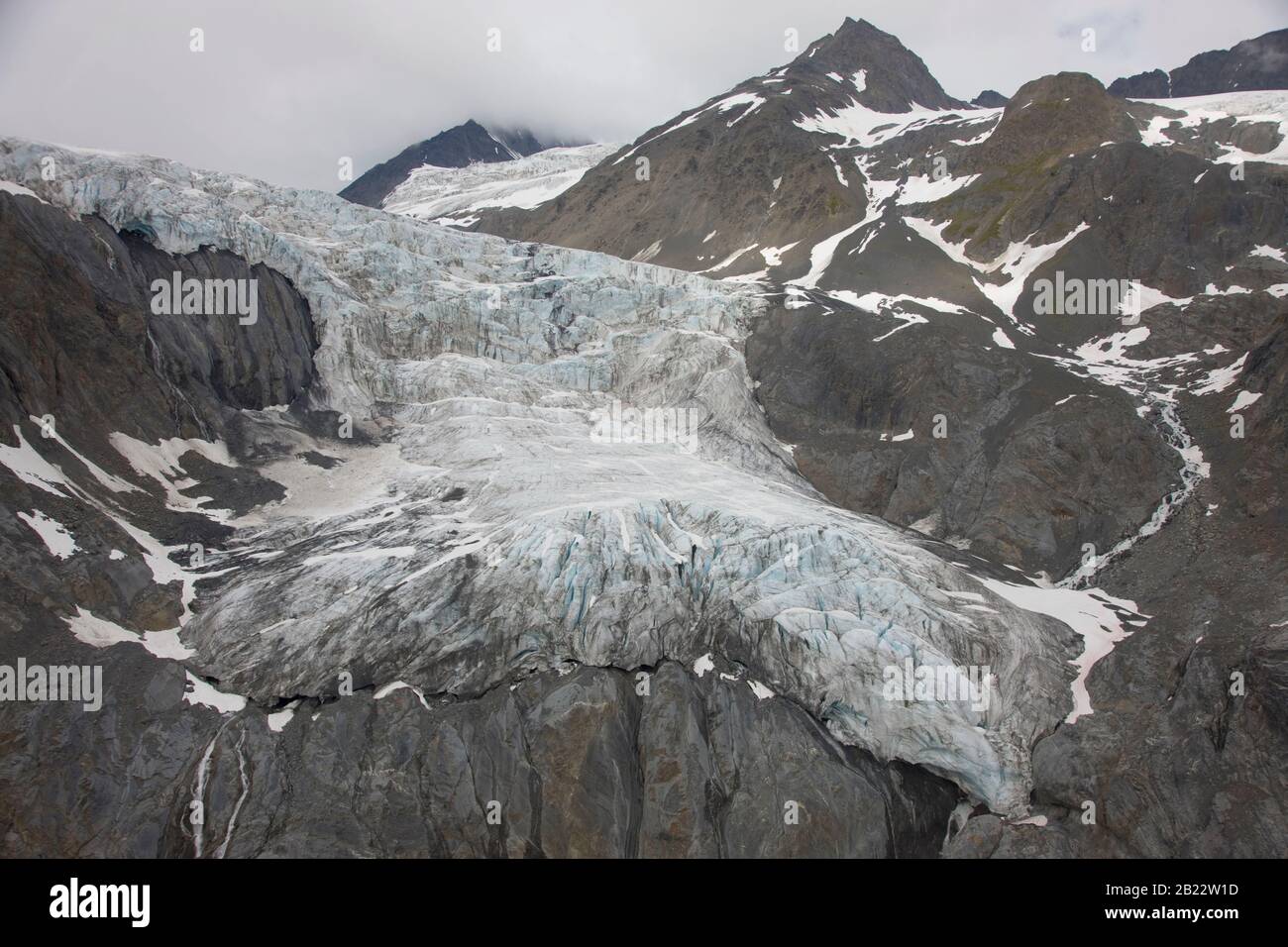 ALASKA, USA - 07 Aug 2008 - Aerial view of a calving glacier in Prince William Sound Alaska USA. Like many glaciers in the world, they are mostly melt Stock Photo