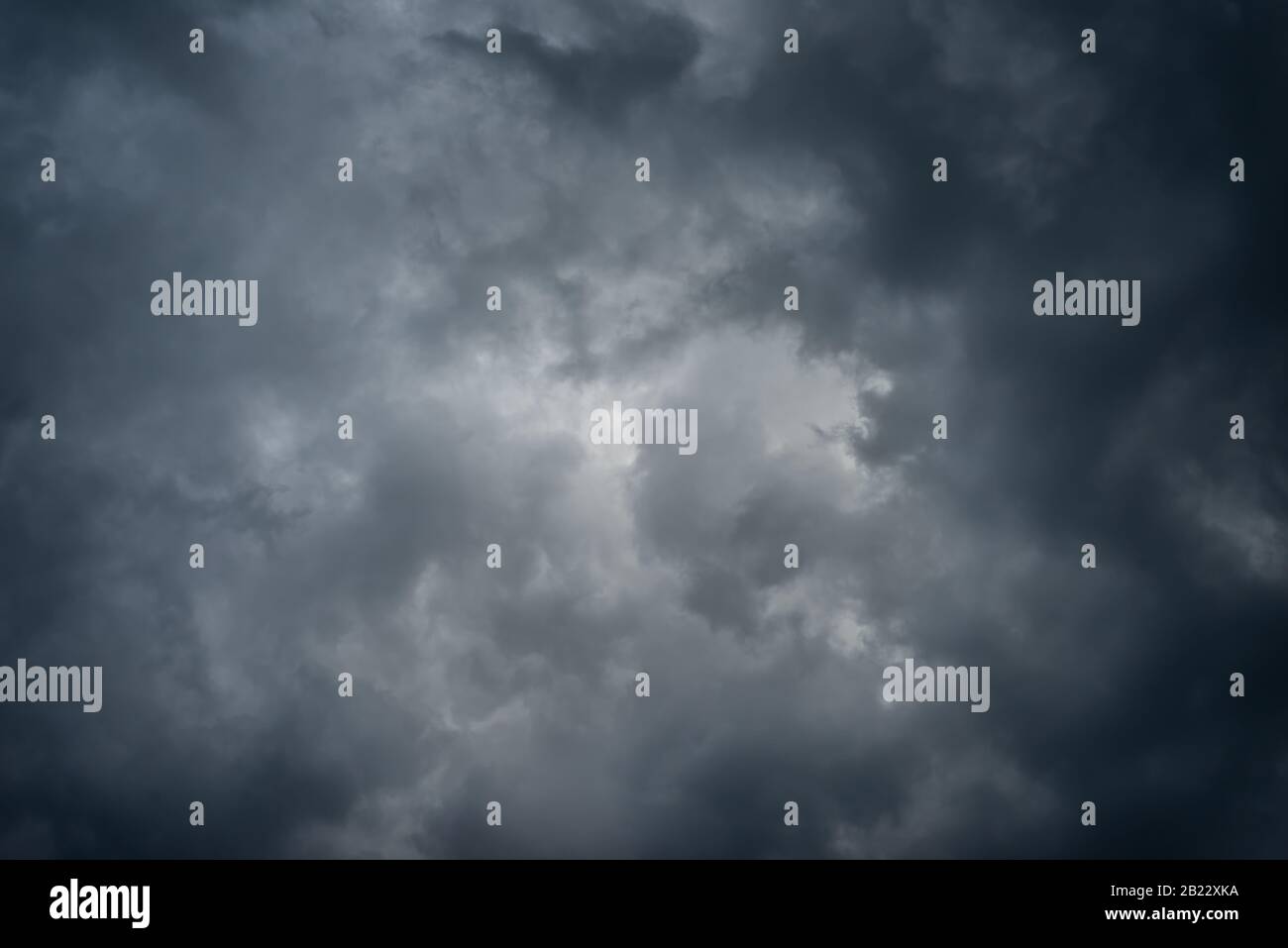 Dark black clouds in the sky, Stormy rain clouds background Stock Photo ...
