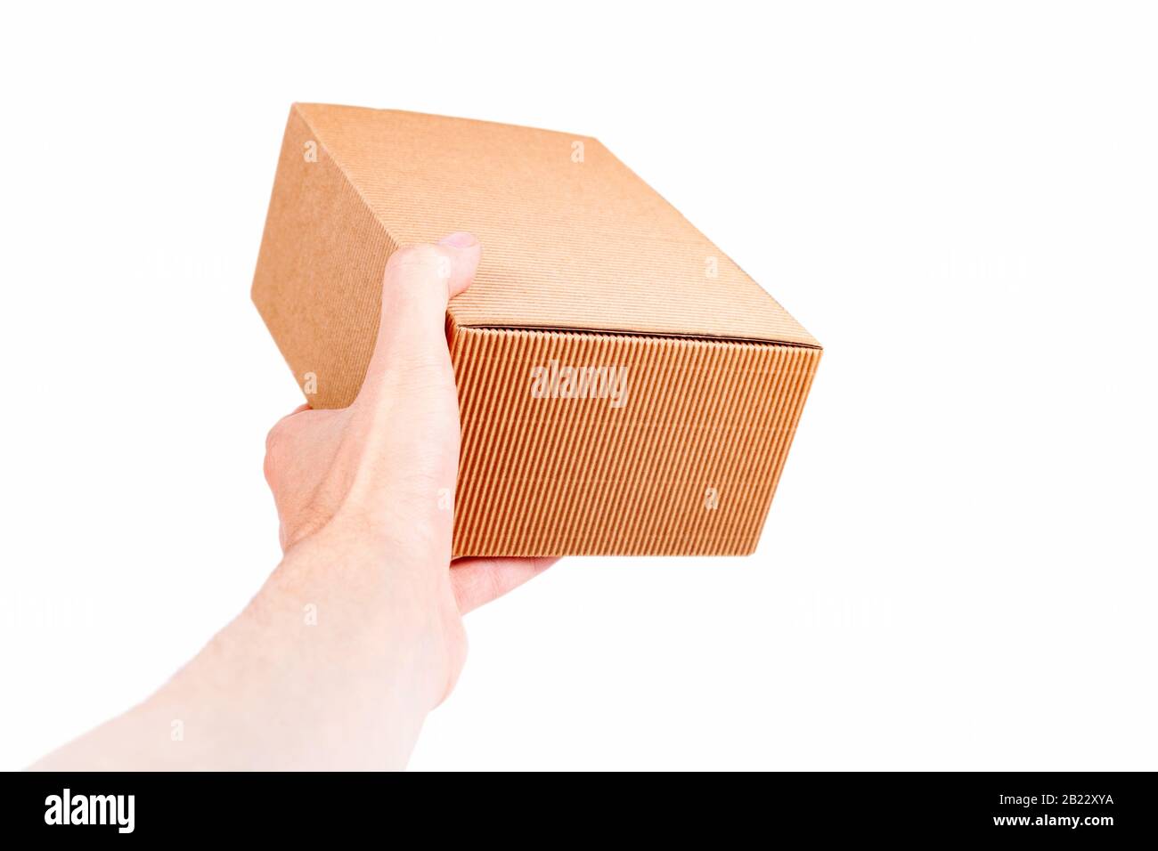 https://c8.alamy.com/comp/2B22XYA/man-handing-a-small-brown-closed-cardboard-package-quick-shipment-delivery-transportation-and-product-shipping-concept-first-person-view-carton-box-2B22XYA.jpg