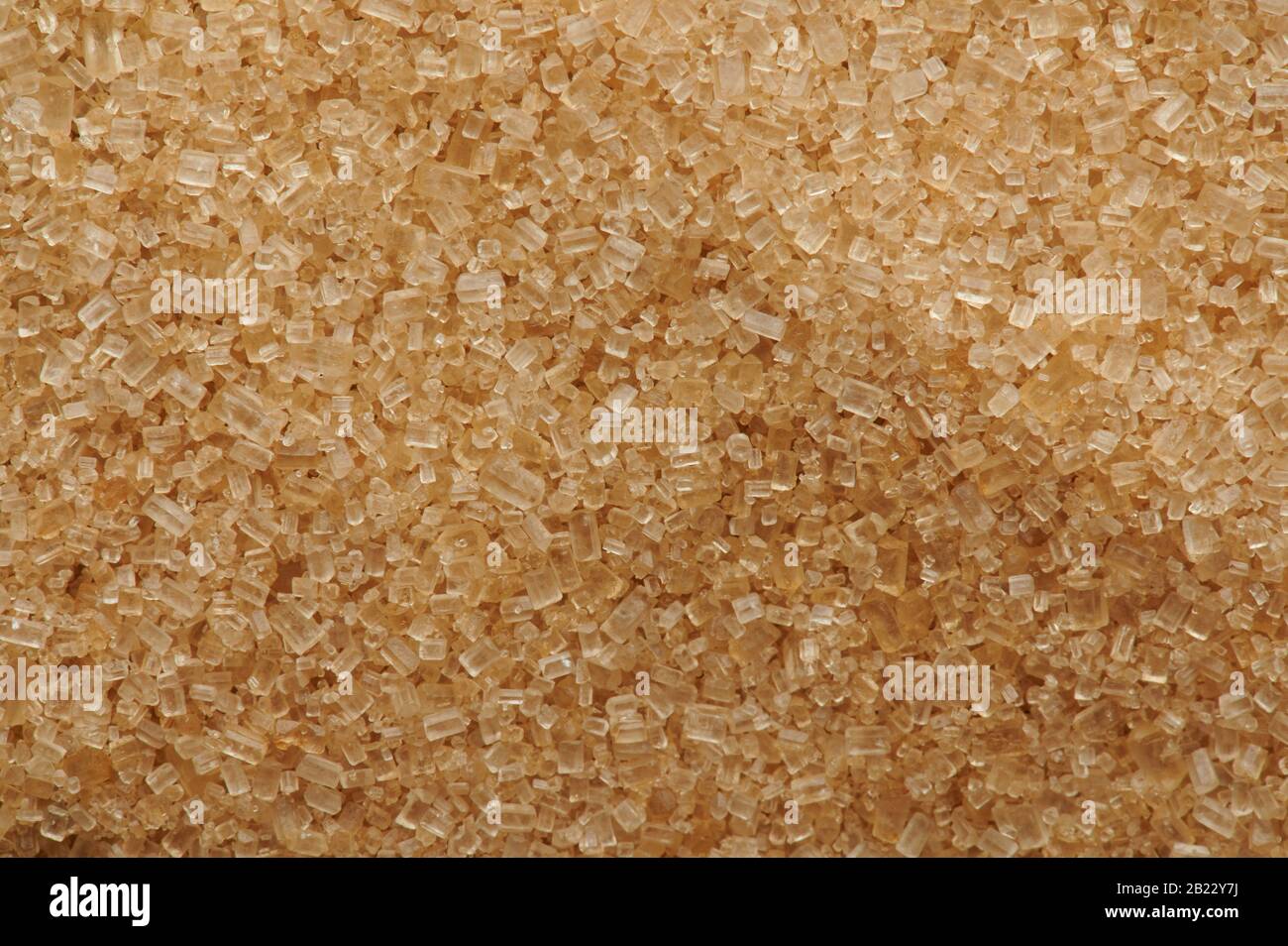Brown sugar granules texture macro close up view Stock Photo Alamy