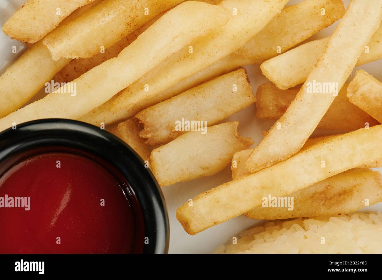 Fresh french fries with tomato ketchup macro close up view Stock Photo