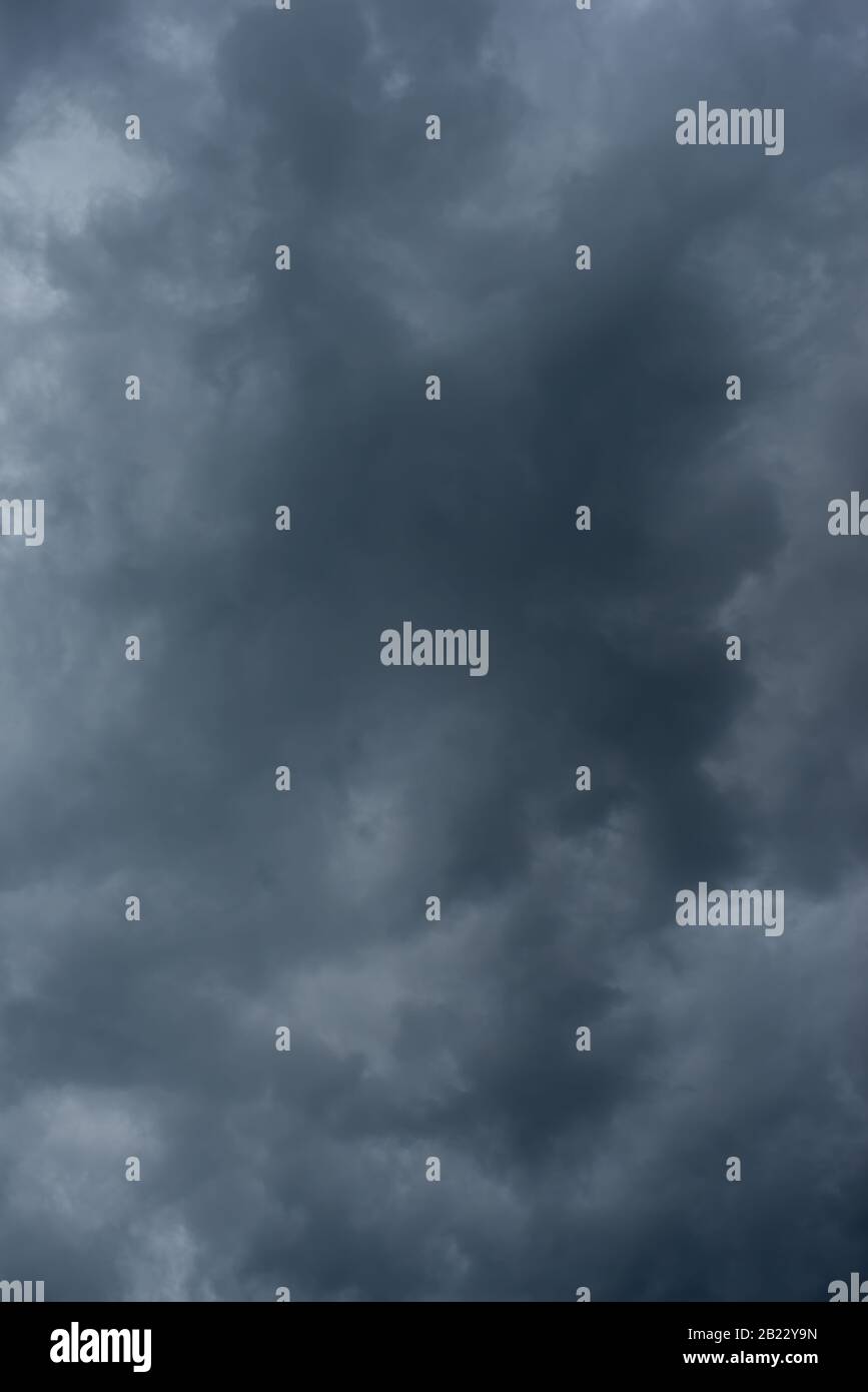 Dark black clouds in the sky, Stormy rain clouds background Stock Photo ...