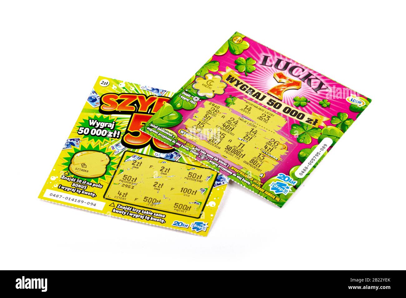 Two scratch off Polish lottery tickets. Gambling, winning money, two lottery paper coupons, tickets, scratchies, scratch cards isolated on white Stock Photo