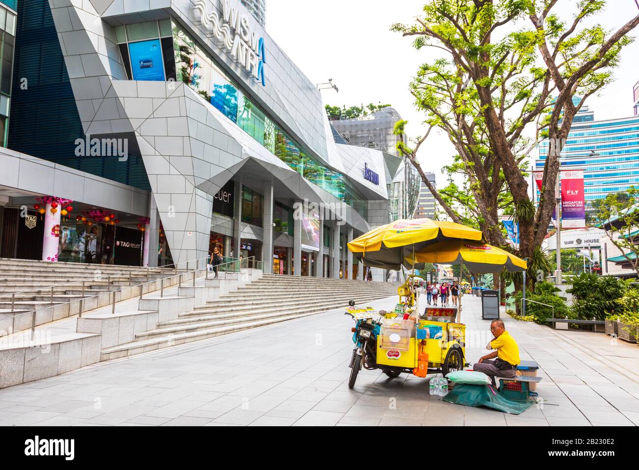 Ice Cream vendor and pedestrians on Orchard Road, the famous shopping