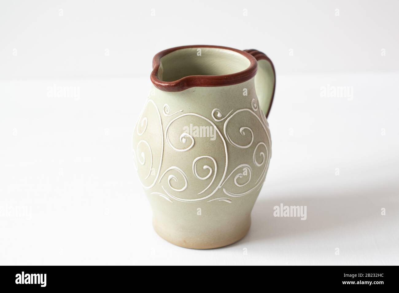 An example of a Denby Pottery Stoneware Ferndale Pitcher / jug on a plain background Stock Photo