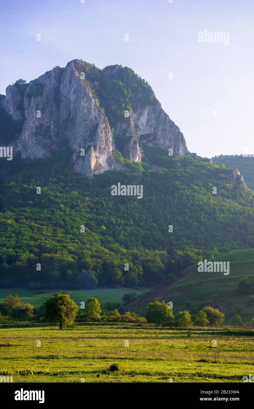 Rural Rocks rock formation on the field at sunrise. beautiful rural landscape in ...