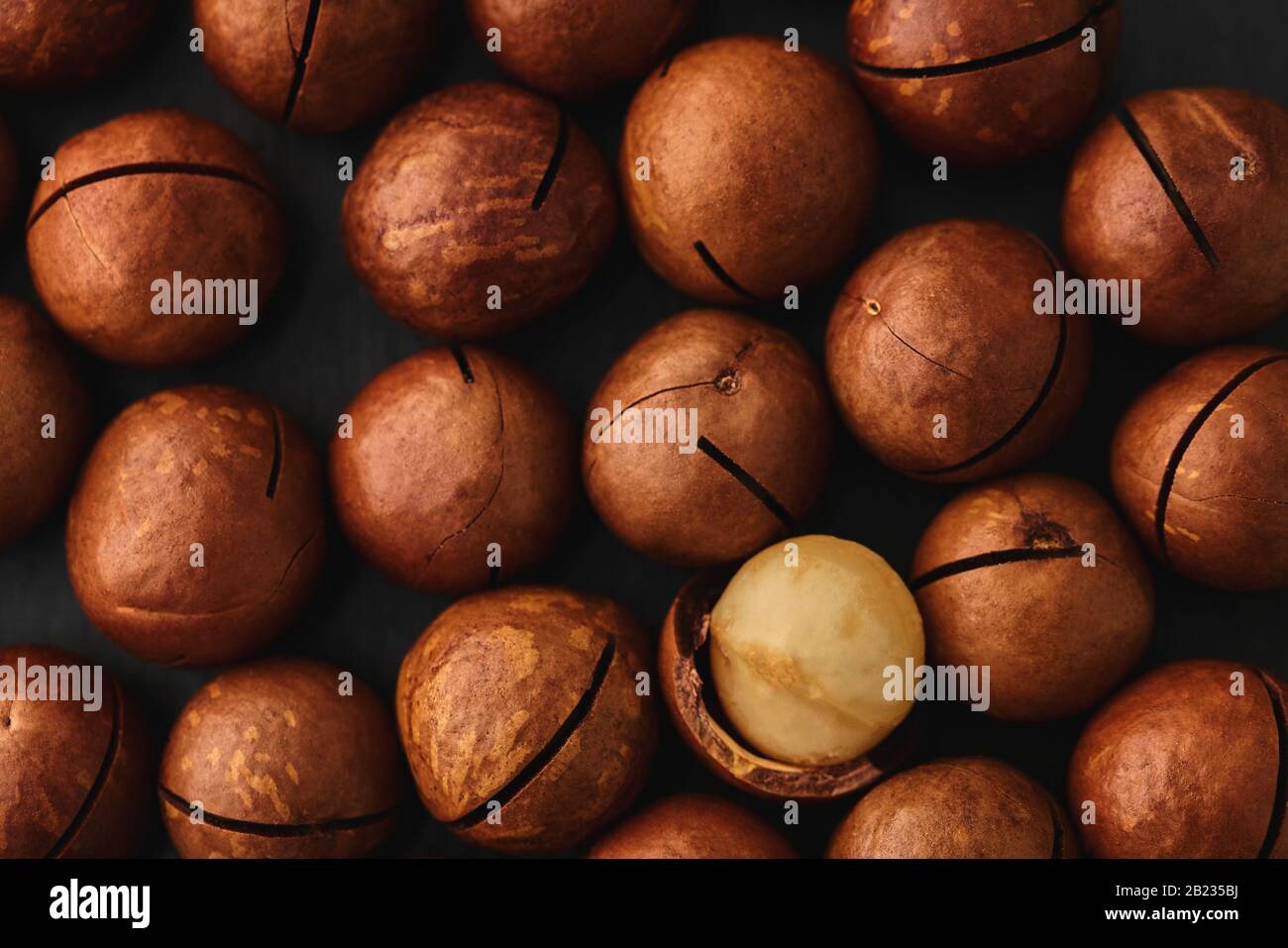 food background texture of macadam nuts closeup Stock Photo