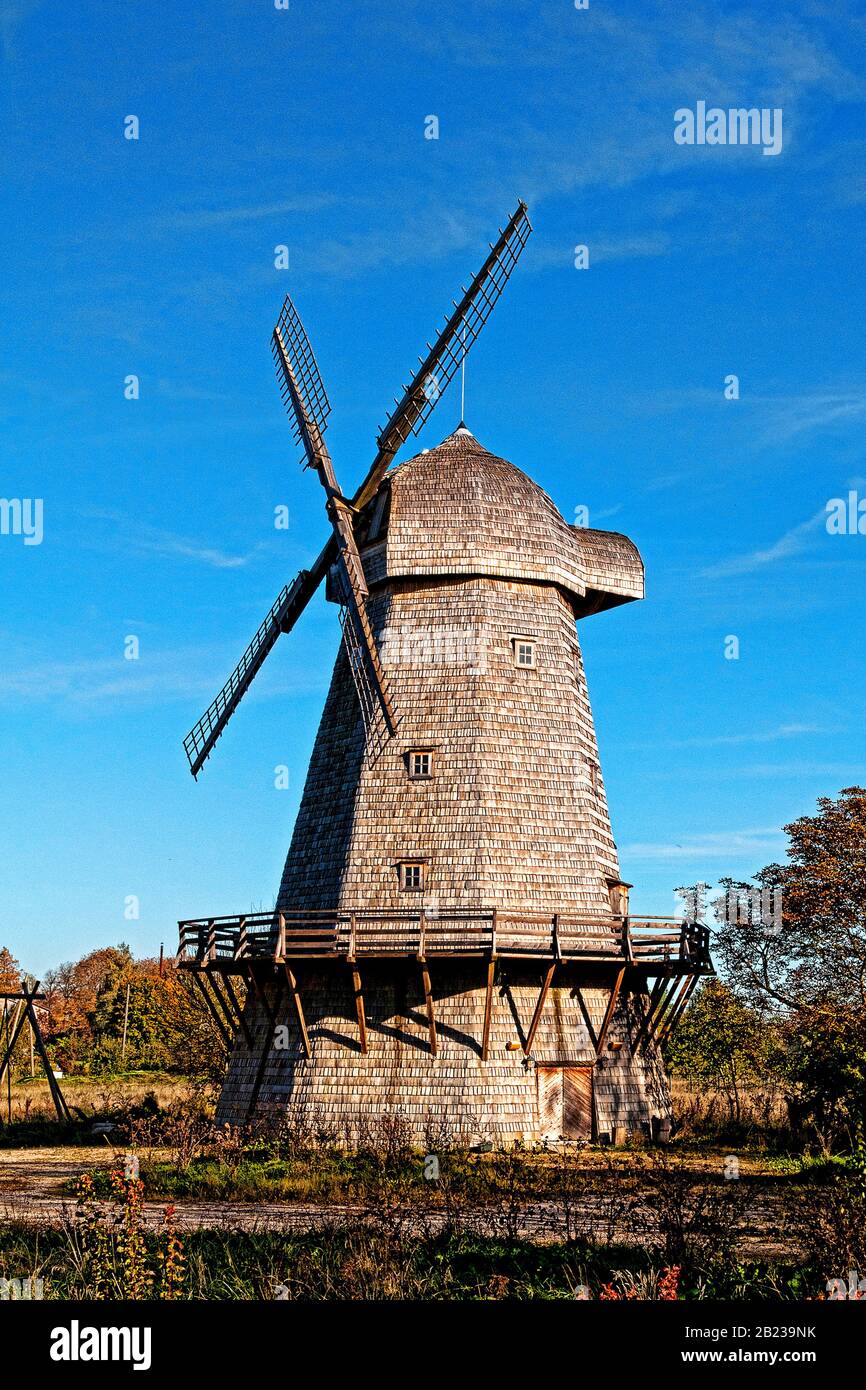 Old fashioned wooden windmill in yard for power in Bauska Latvia Stock Photo