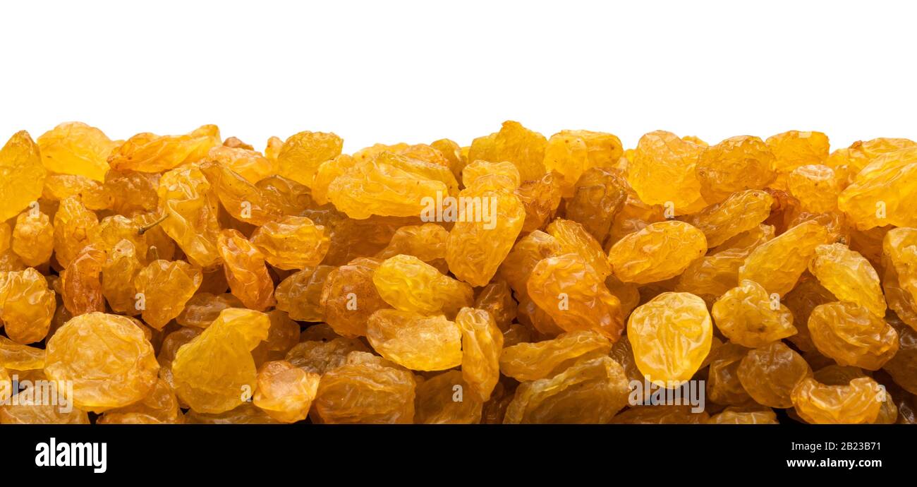 Pile of yellow raisins isolated on white background Stock Photo