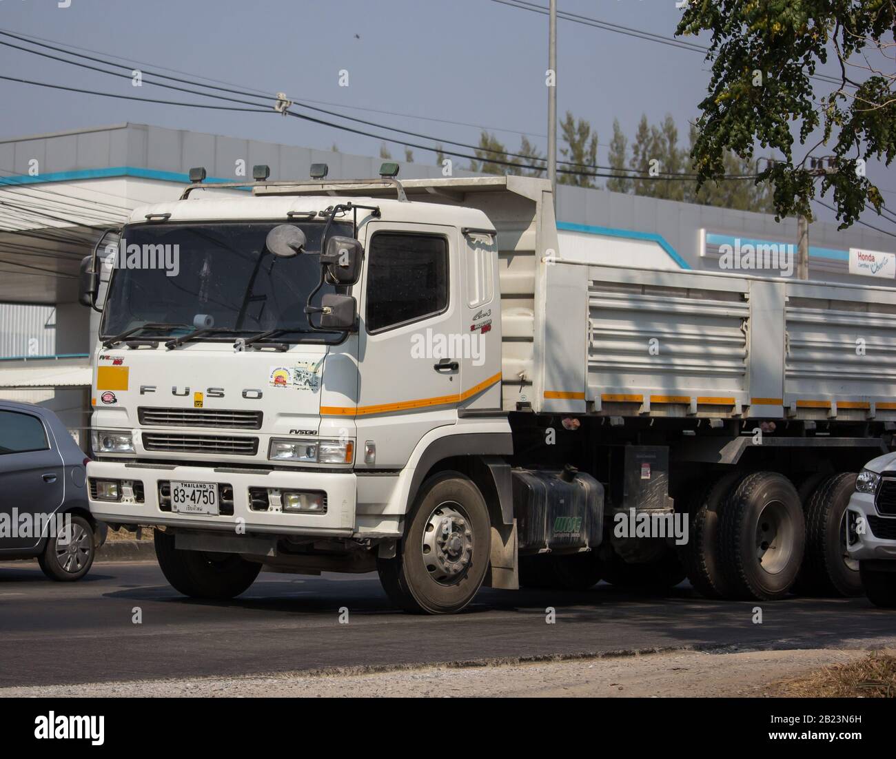 Chiangmai, Thailand - January 21 2020: Private Mitsubishi Fuso Dump Truck.  Photo at road no.121 about 8 km from downtown Chiangmai, thailand. Stock Photo