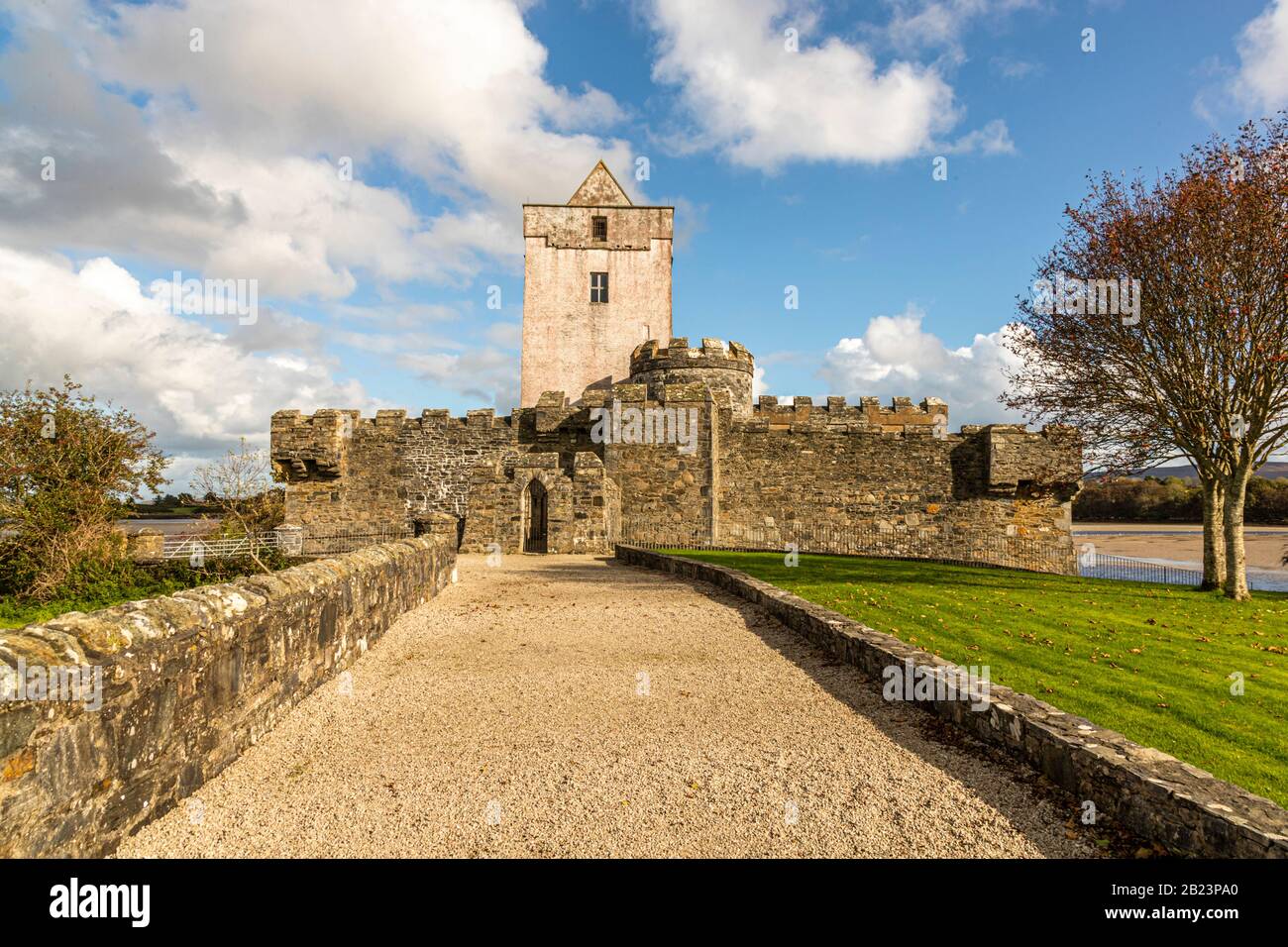 Doe Castle (Irish: Caisleán na dTuath) rises on a small peninsula surrounded by water in County Donegal, Ireland. Built in the early 15th century as the stronghold of Clan Mac Suibhne (MacSweeney), the tower house is among the best-preserved fortalices in north-west Ireland; a moat cut into the rock protects the landward side. Stock Photo