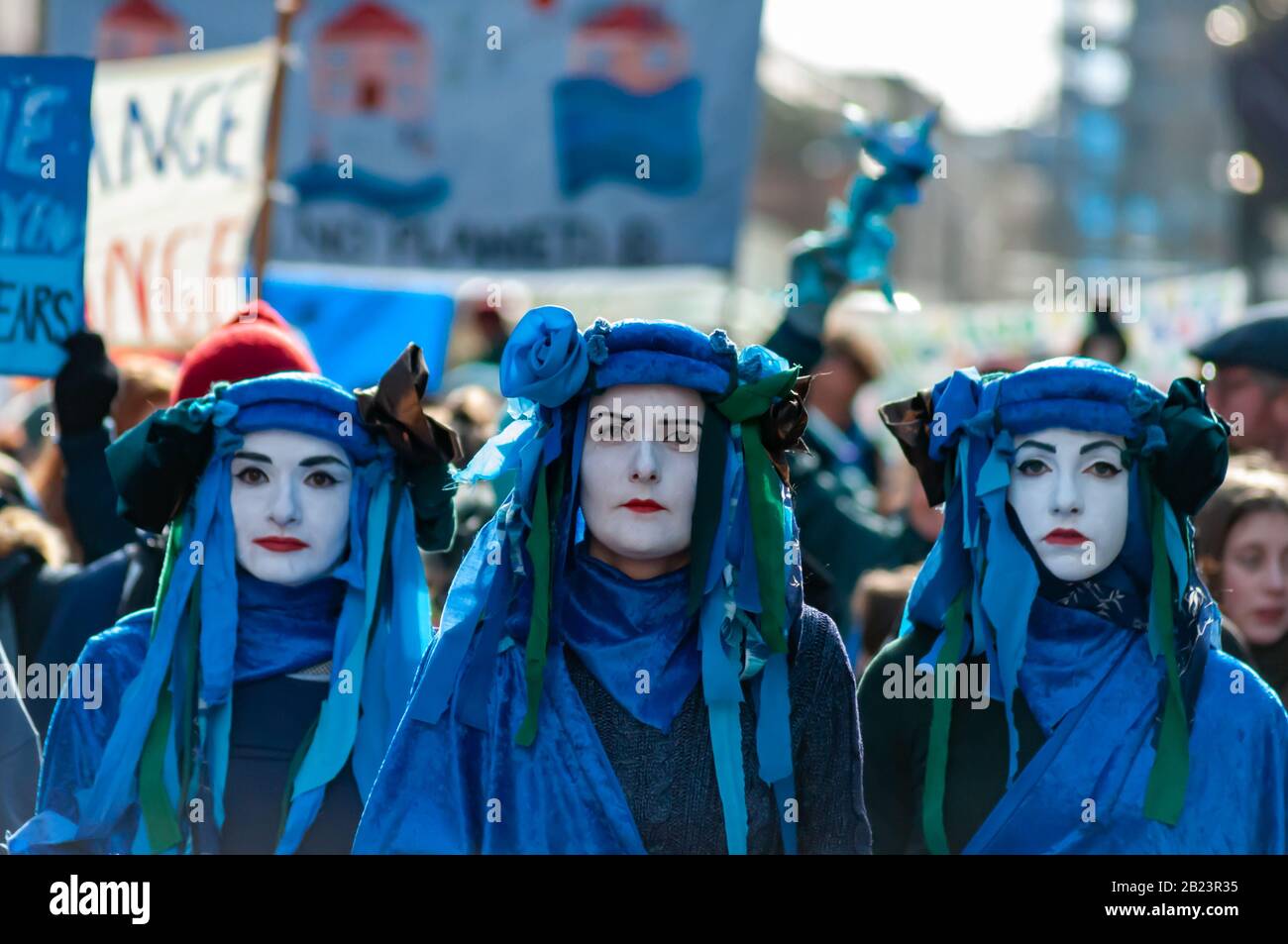 Glasgow, Scotland, UK. 29th February, 2020. The Blue Rebels leading the Blue Wave protest by the environmental campaign group Extinction Rebellion (XR) which saw activists  dressed in blue and green to represent the rising sea levels and flooding caused by increasing global temperatures and climate change. Credit: Skully/Alamy Live News Stock Photo
