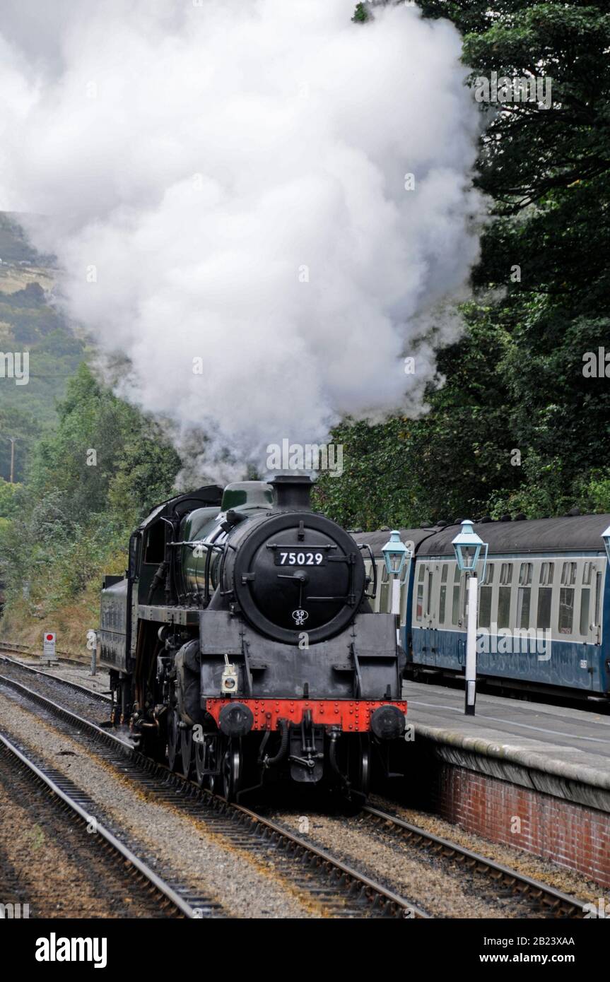 The steam locomotive, No: 75029 is ‘The Green Knight’ at full steam near Grosmont rail station, part of the NYMR (North Yorkshire Moors Railway) in No Stock Photo