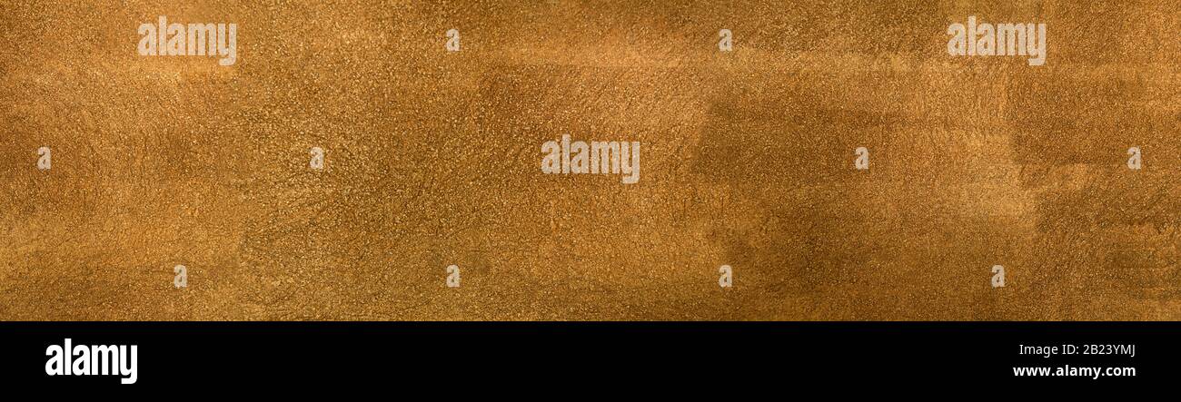 Grainy brown wall texture with small pebbles Stock Photo