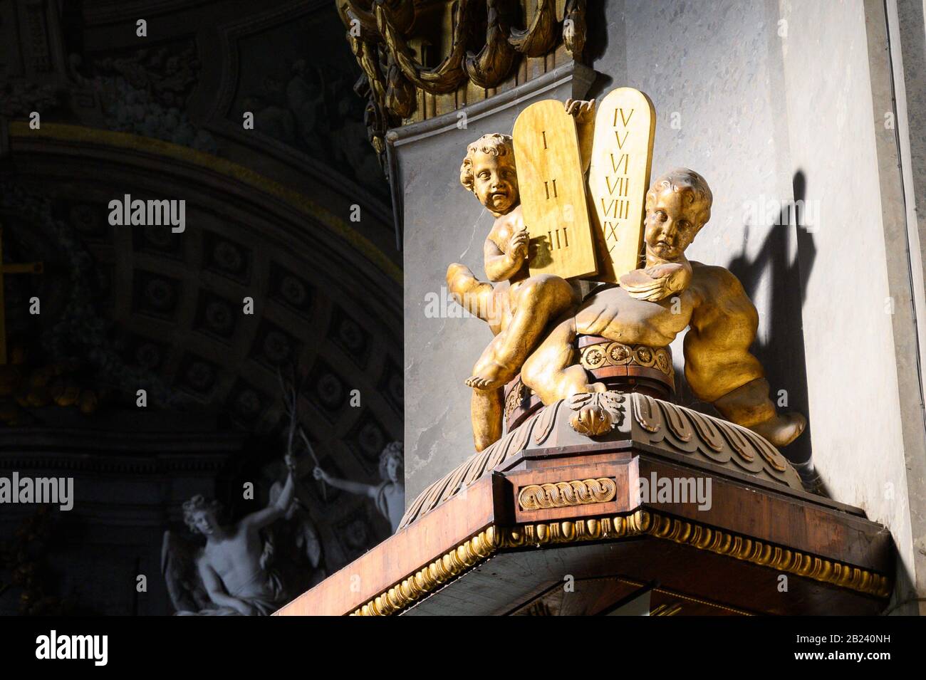 Angels with the Tablets of the Law (Ten Commandments). Church of Saint Stephen in Pápa, Hungary. Stock Photo