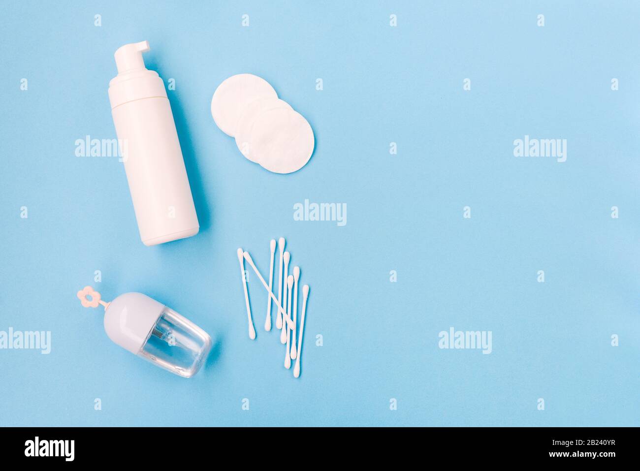 Face care. Feminine hygiene products, washing foam, micellar water, cotton pads and ear sticks Stock Photo