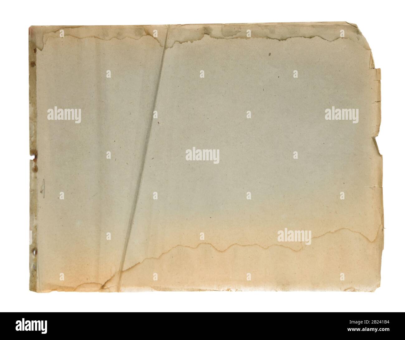 Yellowed rumpled sheet of old paper with torn edges isolated on a white background Stock Photo