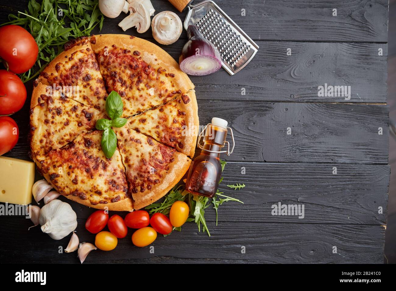Fresh baked, hot american style pizza with all various ingredients on