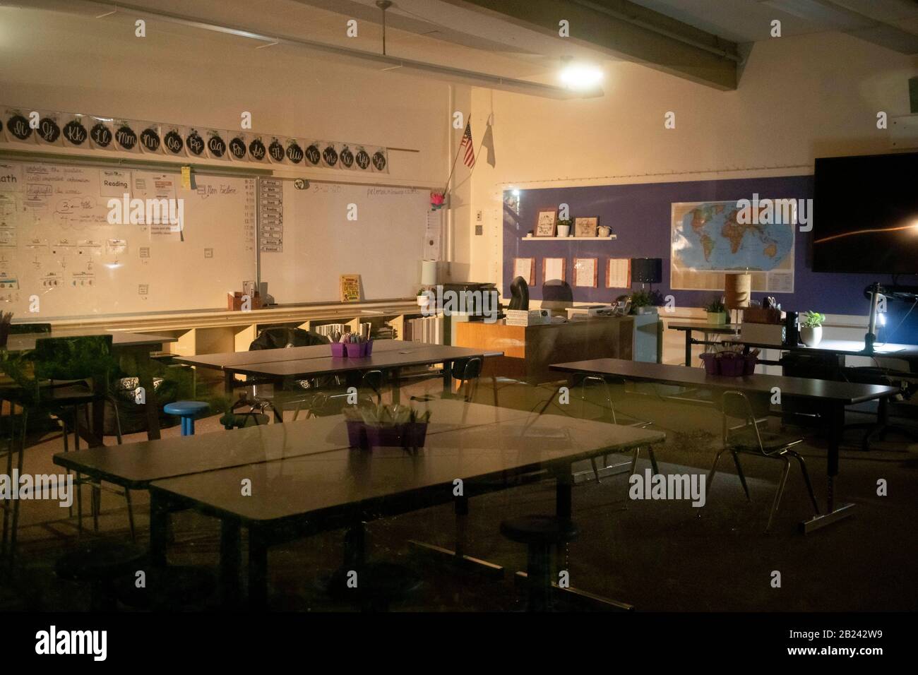 A darkened classroom at the Forest Hills Elementary School in Lake Oswego, Oregon where Oregon public health officials have confirmed a case of community transmission of the COVID-19 coronavirus. The unnamed infected individual has been hospitalized at a local Portland hospital pending a second positive confirmation by the CDC in Atlanta. The school will bremain closed until at least next Wednesday, March 4, 2020. Stock Photo