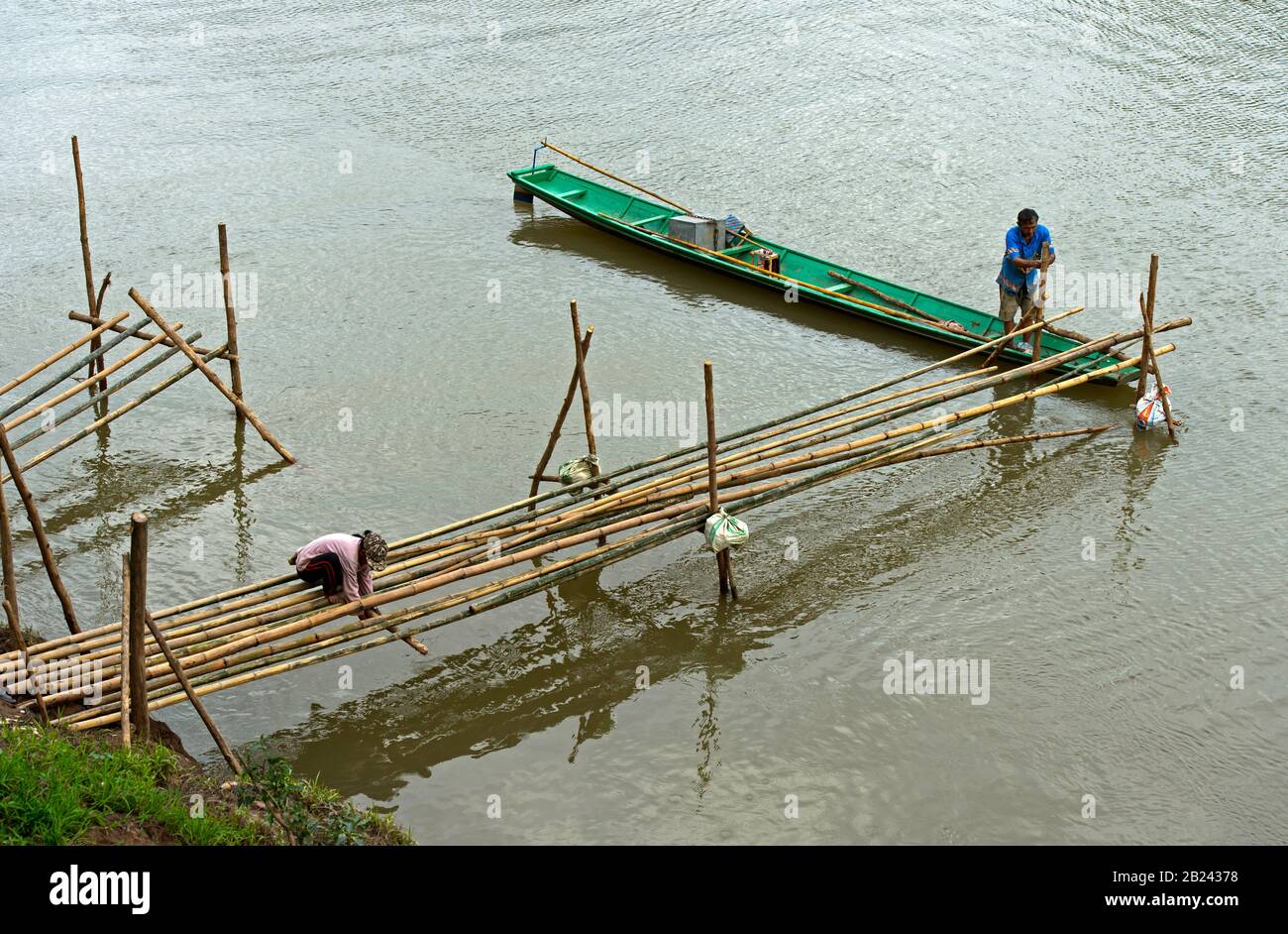 Construction of a bamboo bridge across the Nam Khan river, Luang Prabang, Laos Stock Photo