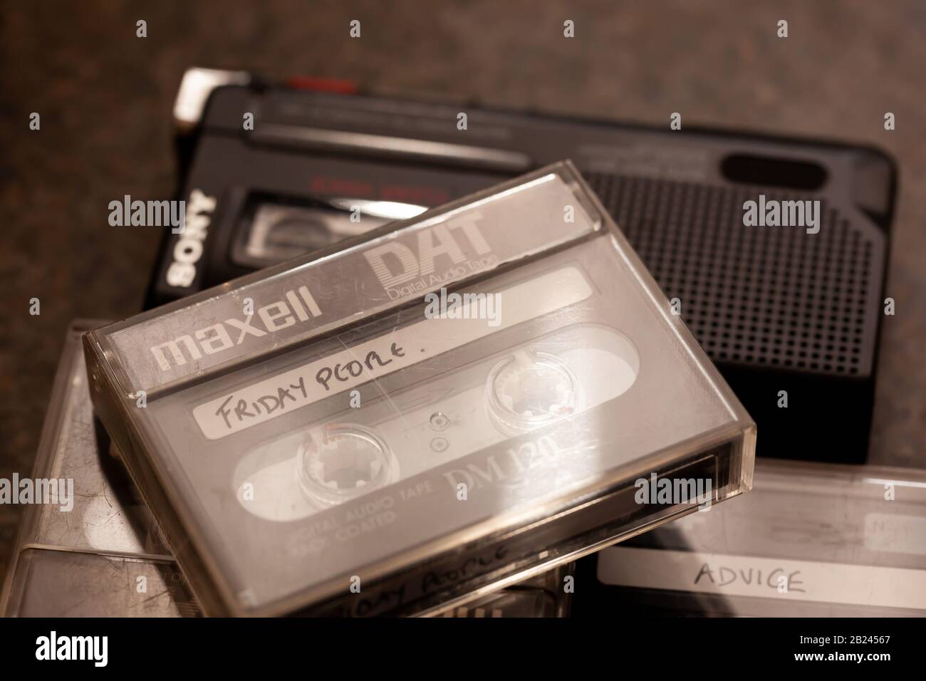 Retro Music concept Set of vintage audio tape cassettes and Sony tape recorder. Editorial only