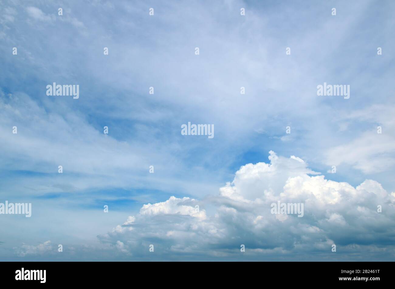 light cumulus clouds in the blue sky Stock Photo - Alamy