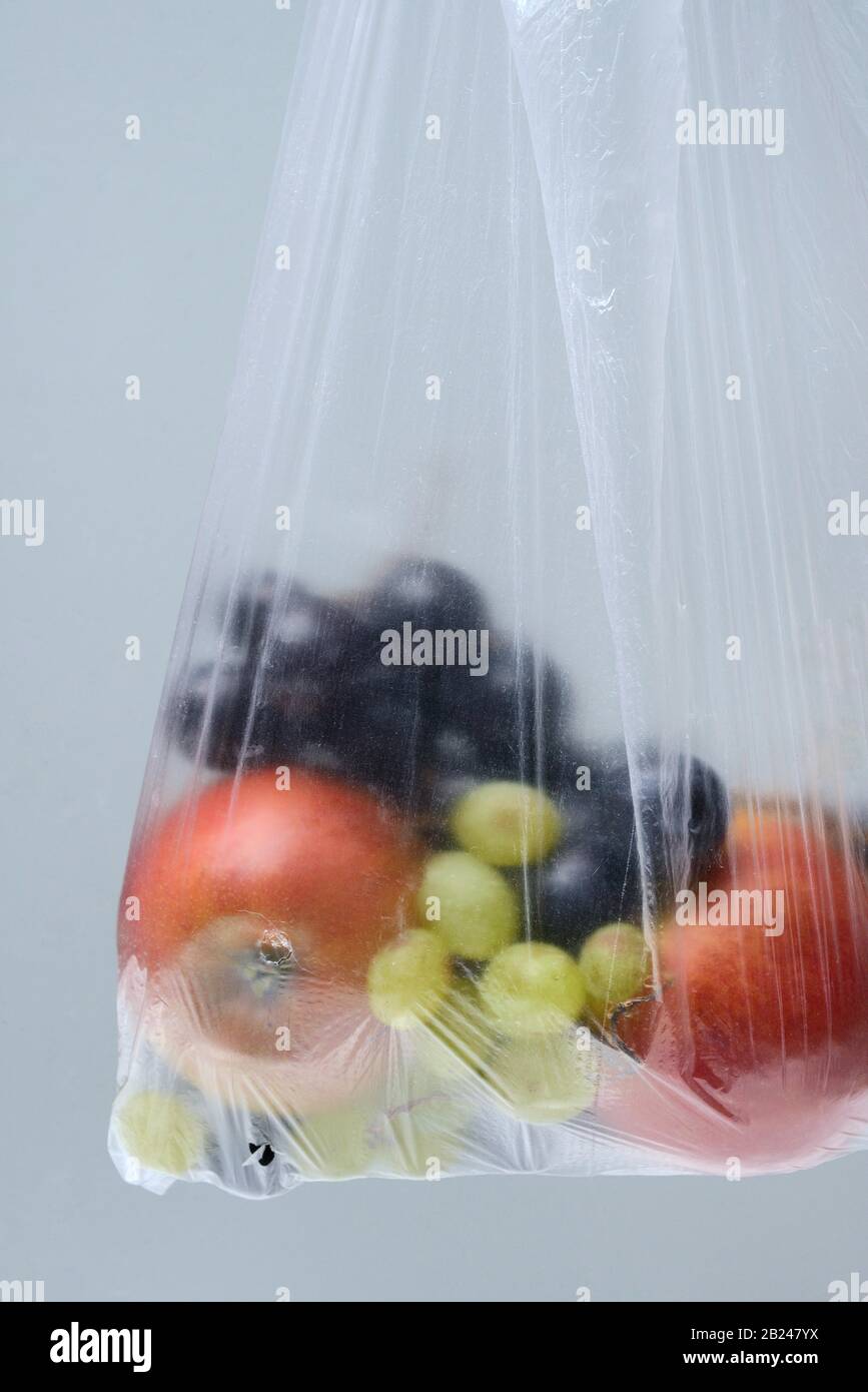 Fruit in plastic bag, Germany Stock Photo