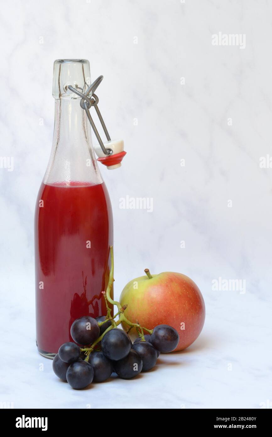 Fruit juice in bottle and fruit, Germany Stock Photo Alamy