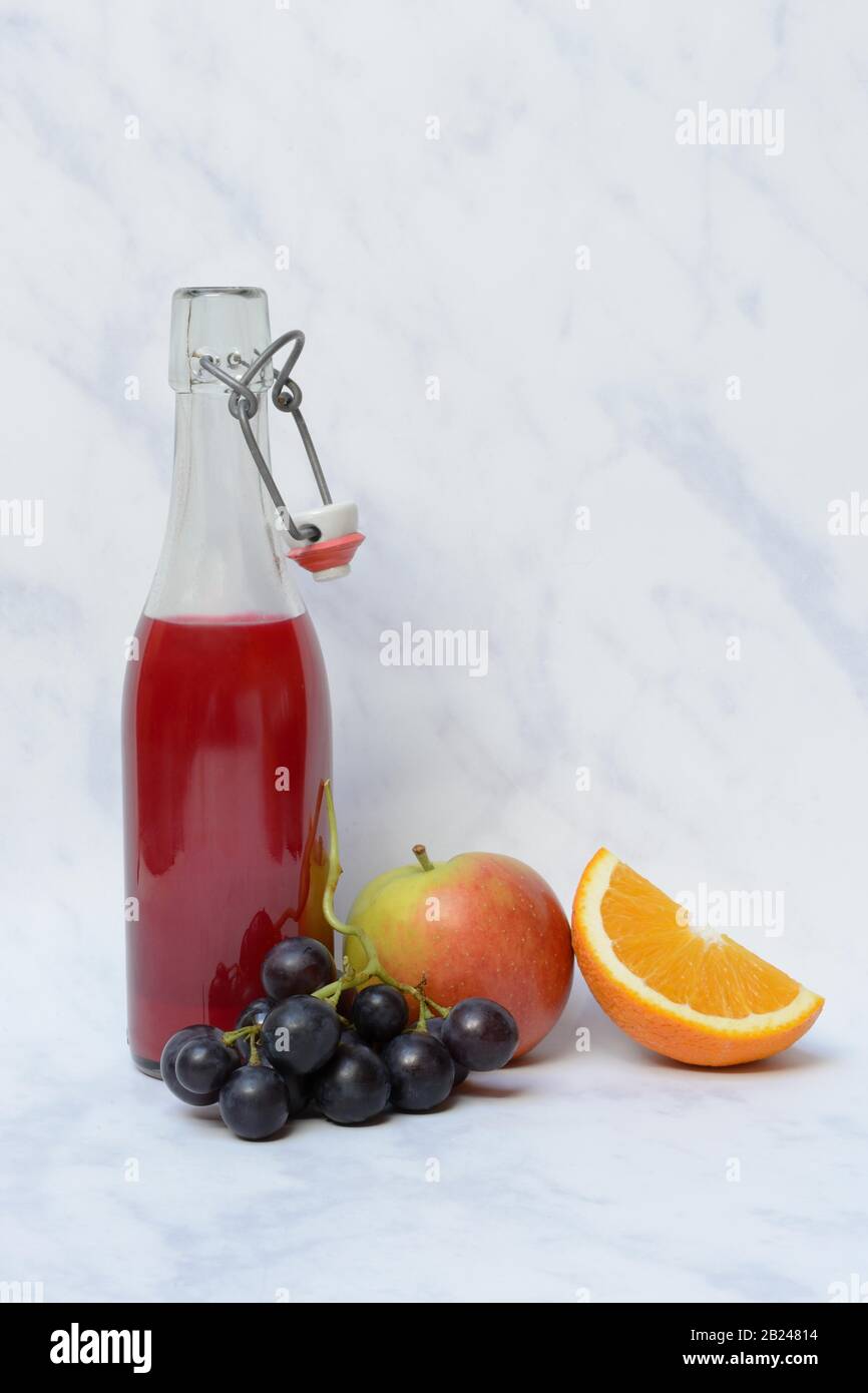 Fruit juice in bottle and fruit, Germany Stock Photo Alamy