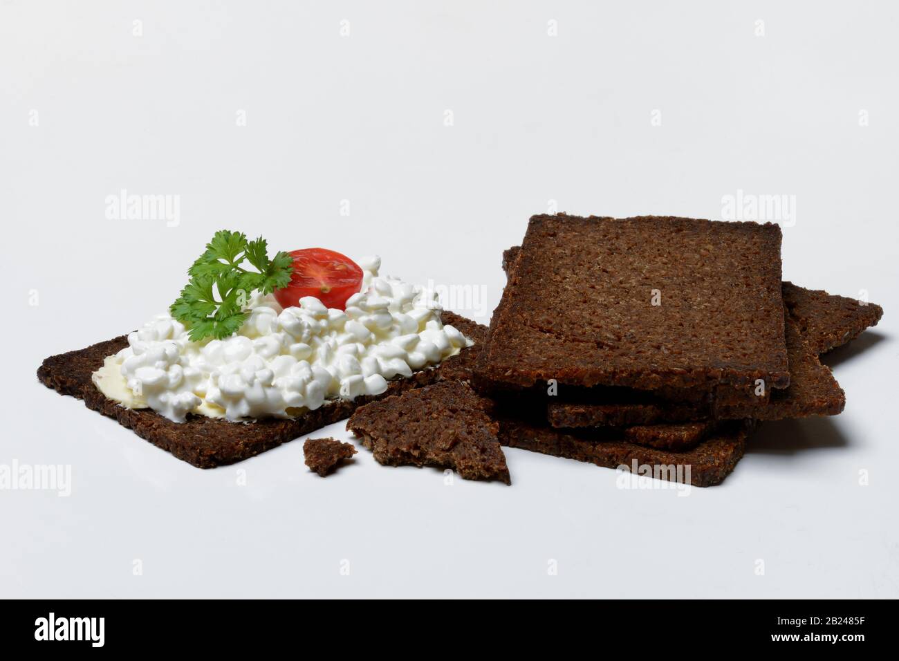 Pumpernickel slices topped with cream cheese, Germany Stock Photo Alamy