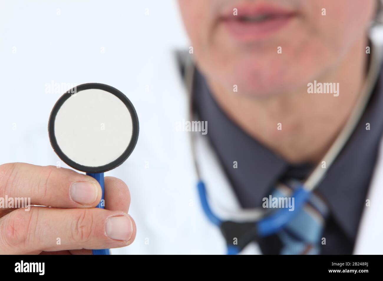 Doctor listening in, Germany Stock Photo