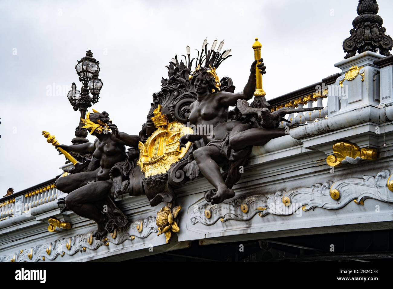 Relief casting Nymphs of the Seine on Pont Alexandre III bridge over the Seine, Paris France Stock Photo