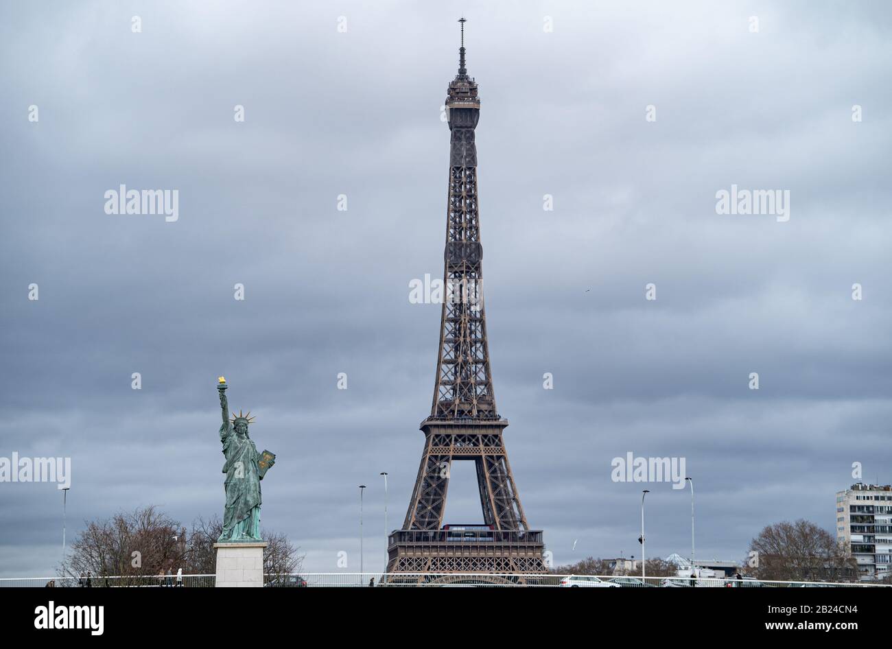 Statue of liberty, Paris France. A replica of the original statue on the Île aux Cygnes with the Eiffel tower Stock Photo