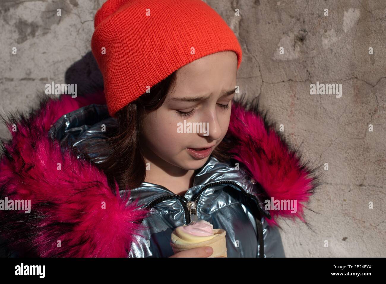 Cute Happy Toddler Girl in Winter Hat 