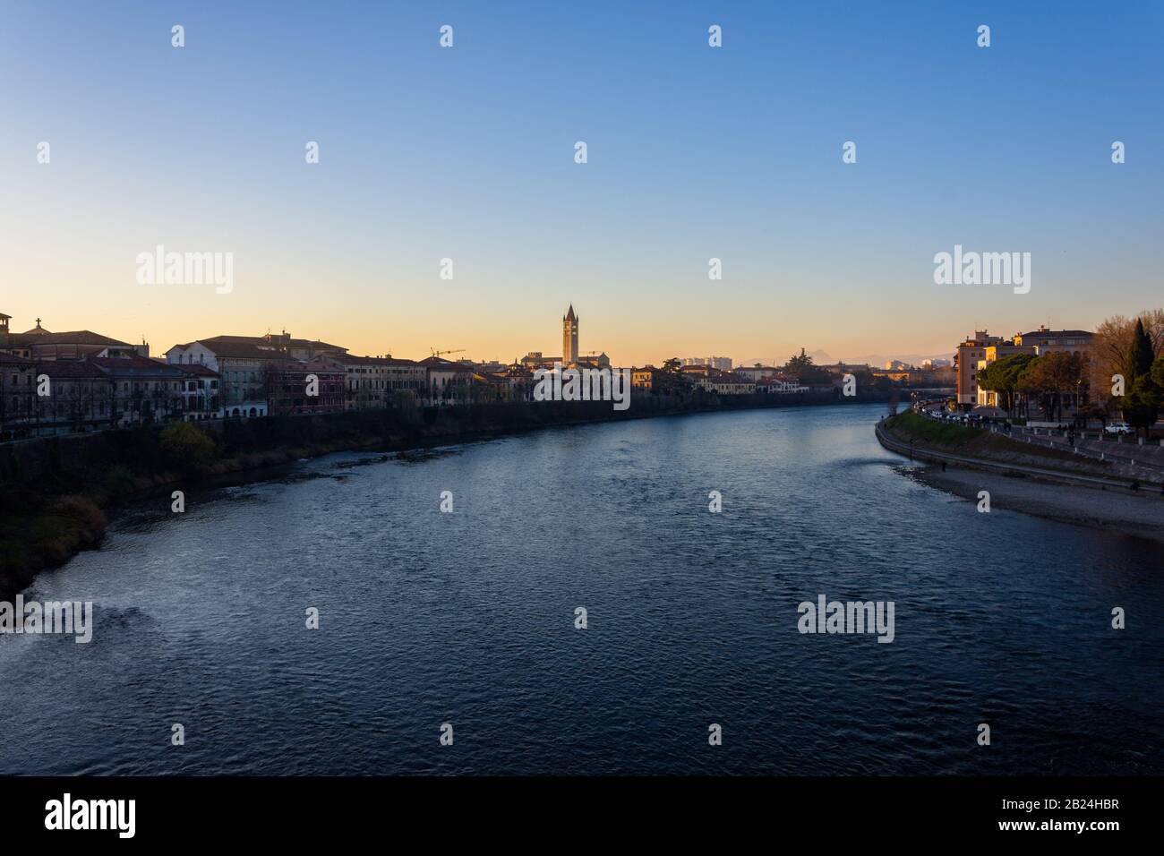 View of Verona and the Adige river from the Castelvecchio bridge, also known as the Scaliger bridge at the sunset Stock Photo