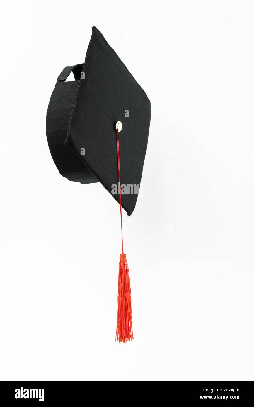 Graduation cap with red tassel isolated on white Stock Photo Alamy