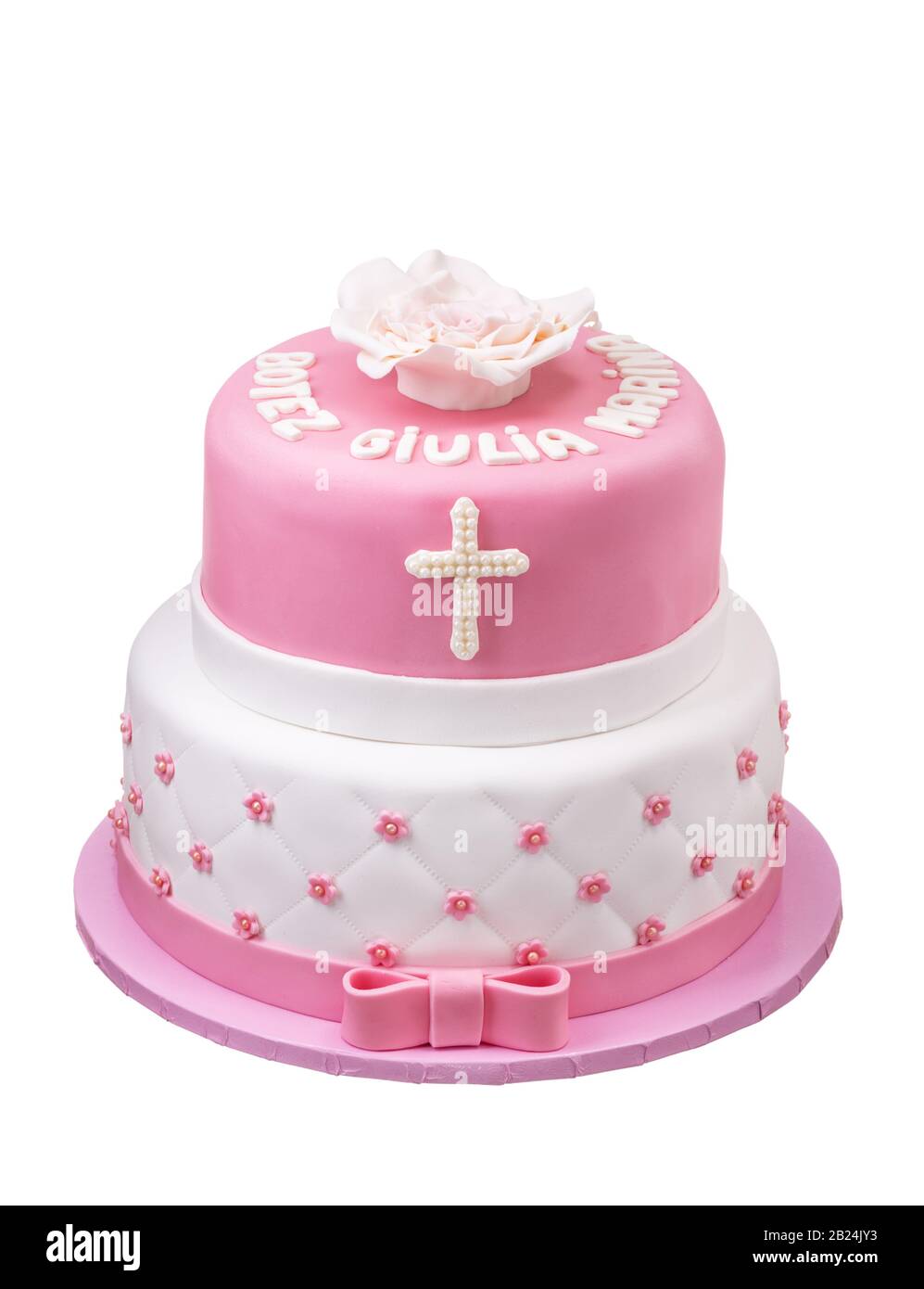 Two-tier pink cake for baptism girl Stock Photo - Alamy