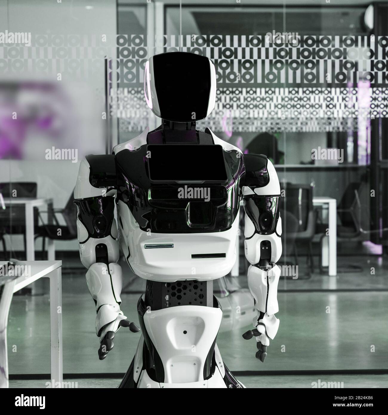 humanoid robot standing in conference hall of modern office Stock Photo ...