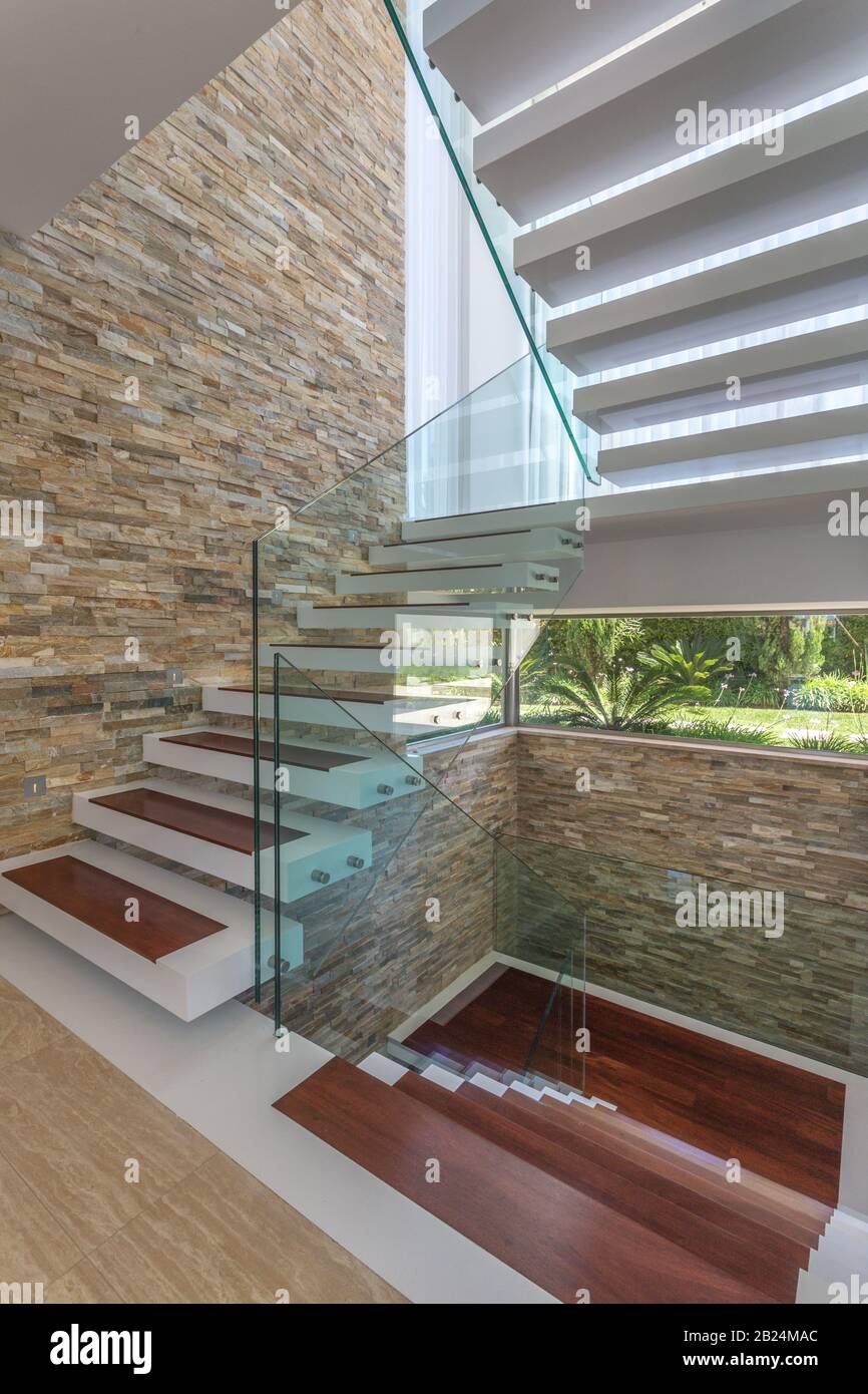 The entrance hall in the house is an office with a modern design and steps  Stock Photo - Alamy, image size:866x1390