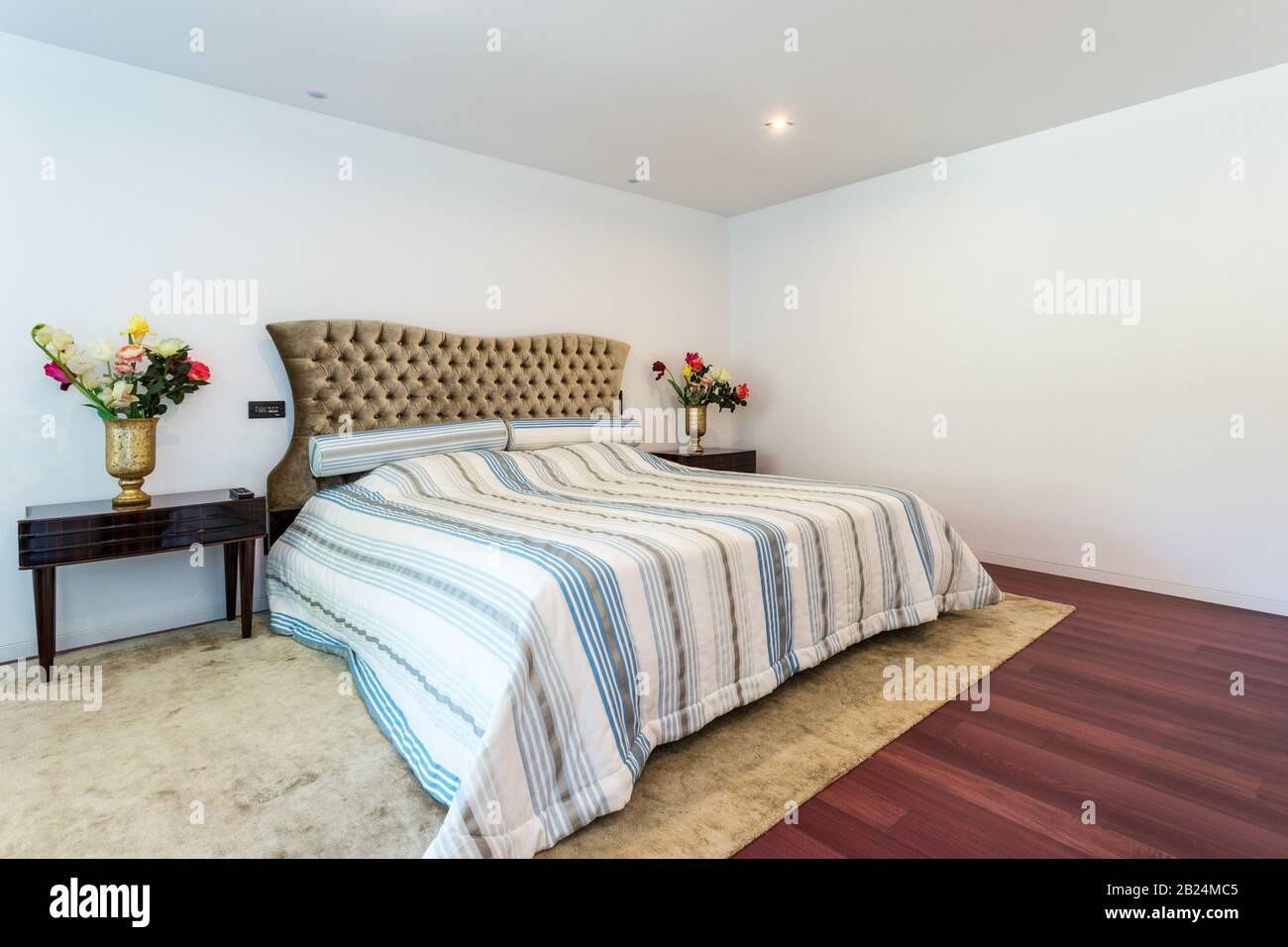 Stylish bedroom in a modern house. For family Stock Photo - Alamy