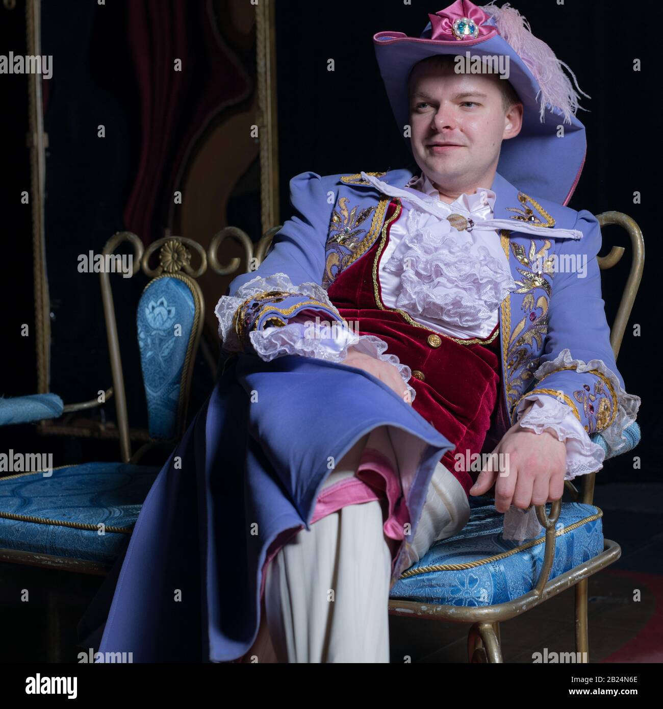 Actor dressed historical costume in interior of old theater Stock Photo ...