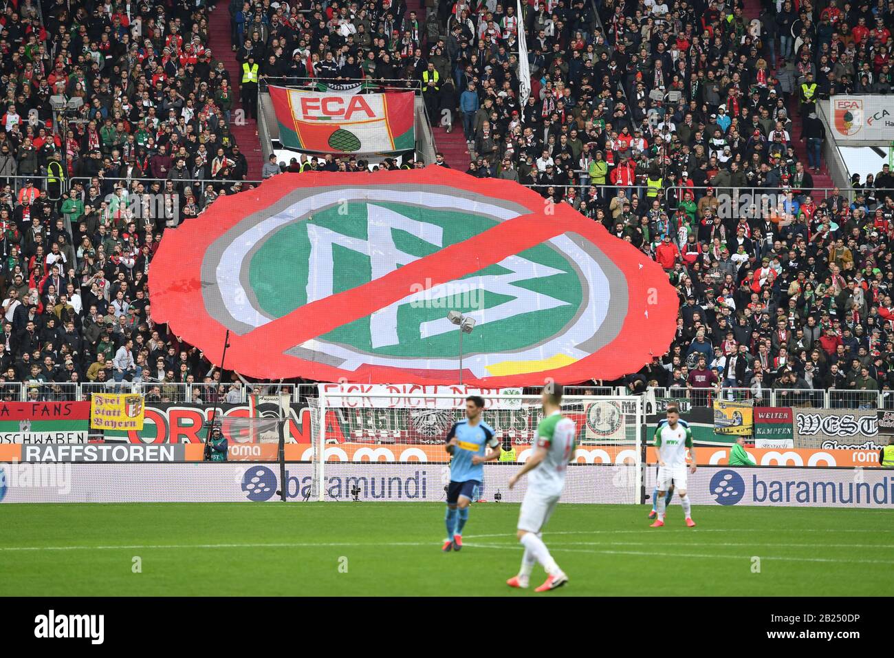 Anti DFB protest by ULTRAS from Augsburg. DFB logo, banner, transparent. Soccer 1.Bundesliga, 24.matchday, matchday24, FC Augsburg (A) -Borussia Monchengladbach (MG) 2-3. on February 29, 2020 in Augsburg, WWKARENA, DFL REGULATIONS PROHIBIT ANY USE OF PHOTOGRAPHS AS IMAGE SEQUENCES AND/OR QUASI-VIDEO. ? Sven Simon Fotoagentur GmbH & Co. Press Photo KG # Prinzess-Luise-Str. 41 # 45479 M uelheim/R uhr # Tel. 0208/9413250 # Fax. 0208/9413260 # GLS Bank # BLZ 430 609 67 # Kto. 4030 025 100 # IBAN DE75 4306 0967 4030 0251 00 # BIC GENODEM1GLS # www.svensimon.net. | usage worldwide Stock Photo