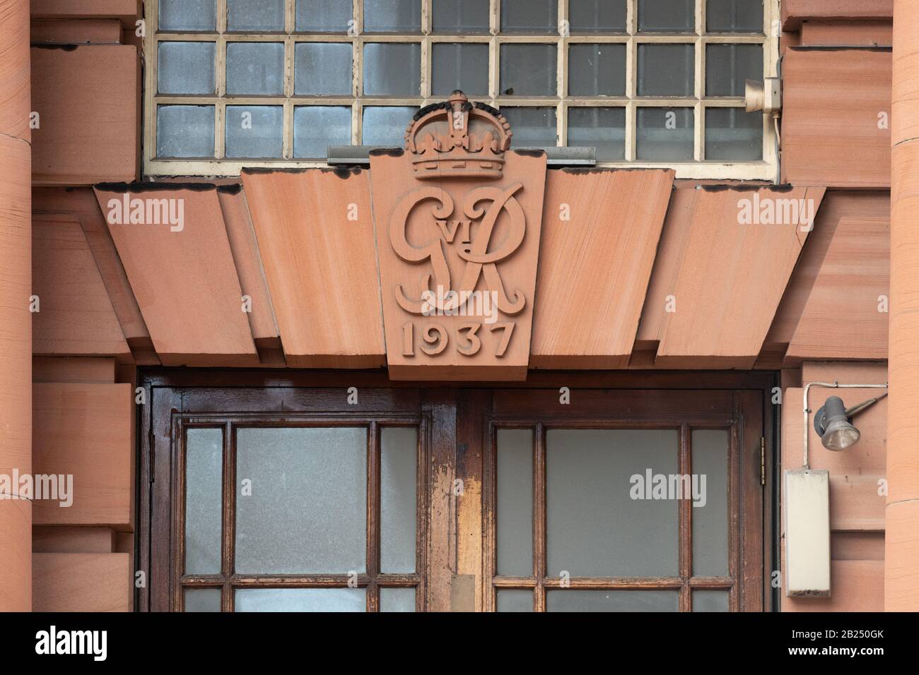 Royal Cypher of George VI above entrance to Glasgow Telephone Exchange, Telephone House, Glasgow, Scotland, UK Stock Photo