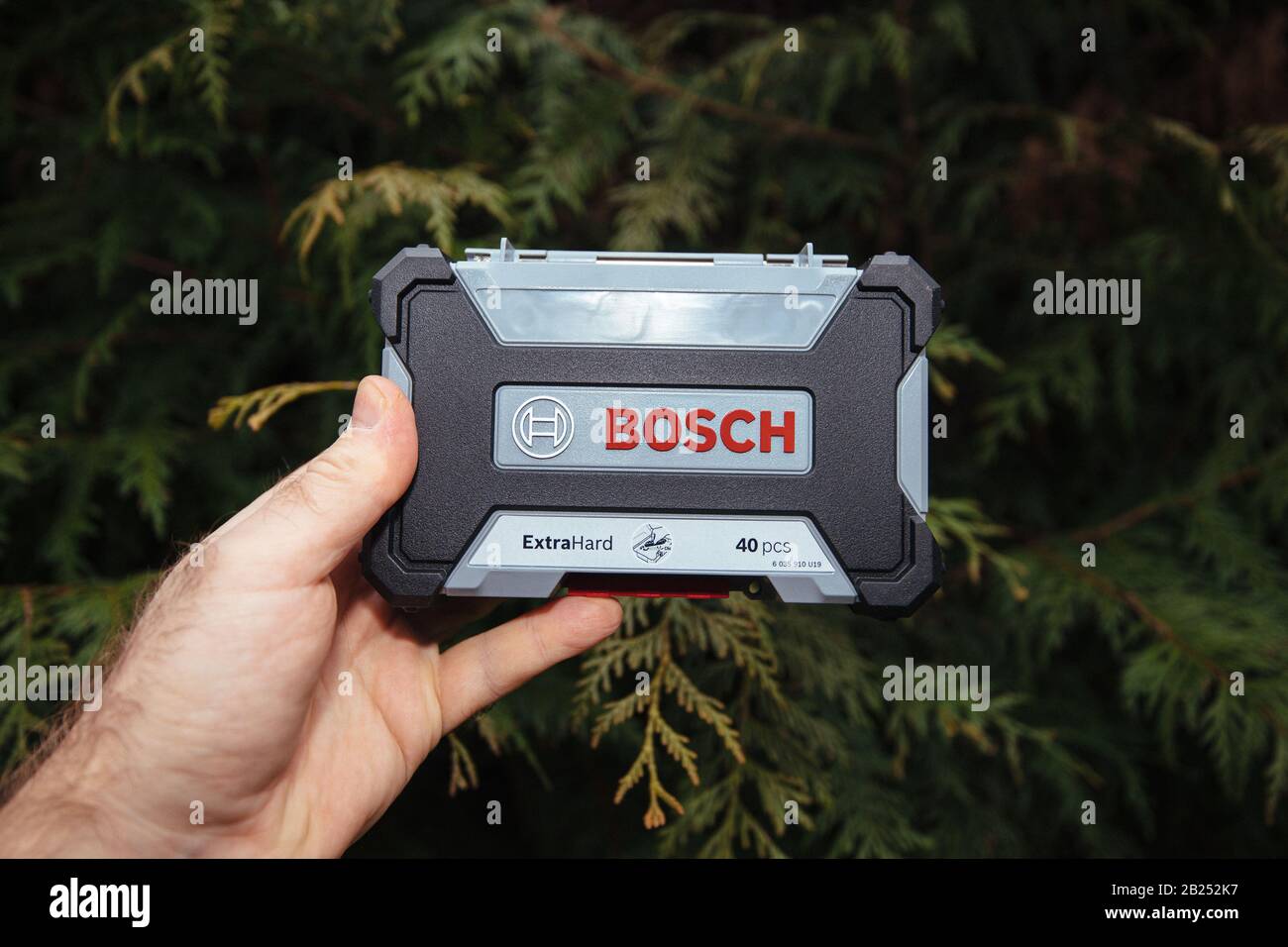 Paris, France - Feb 23, 2020: Man hand holding front view of new package  for Bosch professional cordless screwdriver accessories pick click set 40  pieces - rear part Stock Photo - Alamy