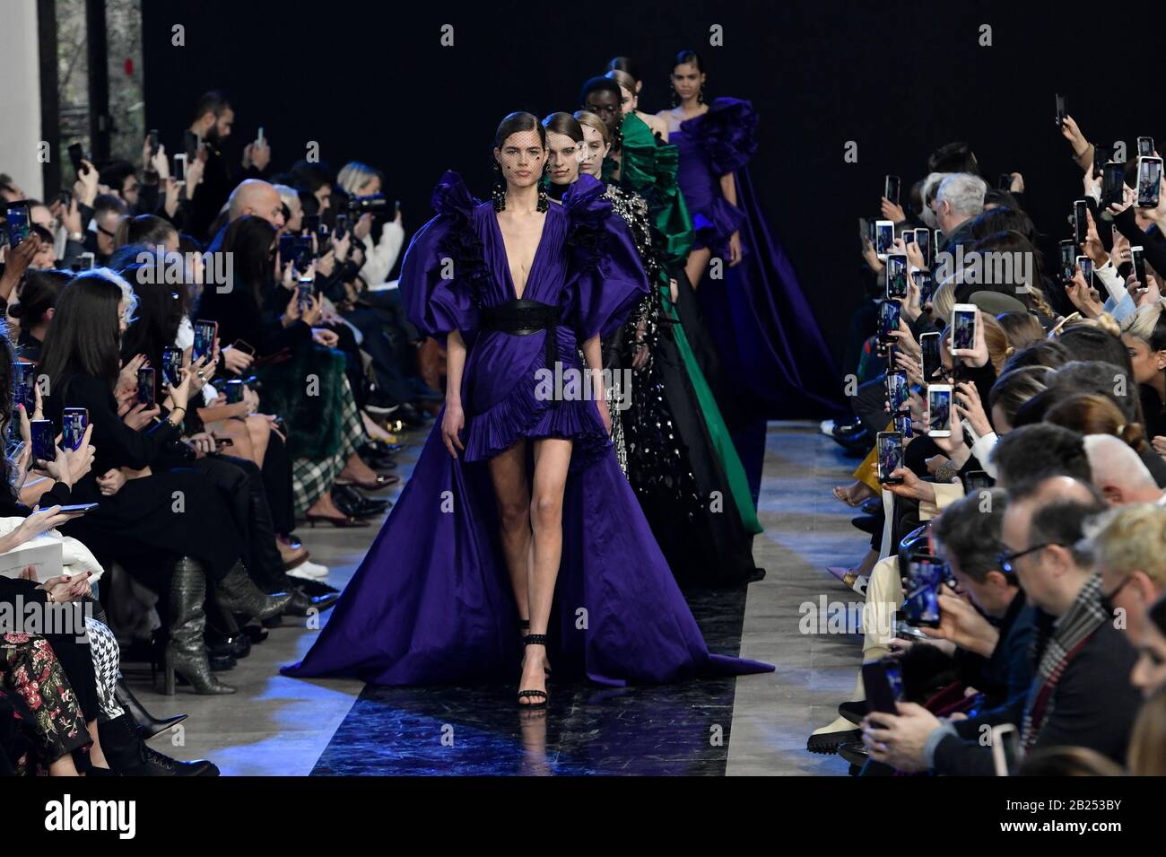 Paris, France. 29th Feb, 2020. Models present creations by Elie Saab during  the Women's Fall-Winter 2020-2021 Ready-to-Wear collection fashion show in  Paris, France, on Feb. 29, 2020. Credit: Piero Biasion/Xinhua/Alamy Live  News