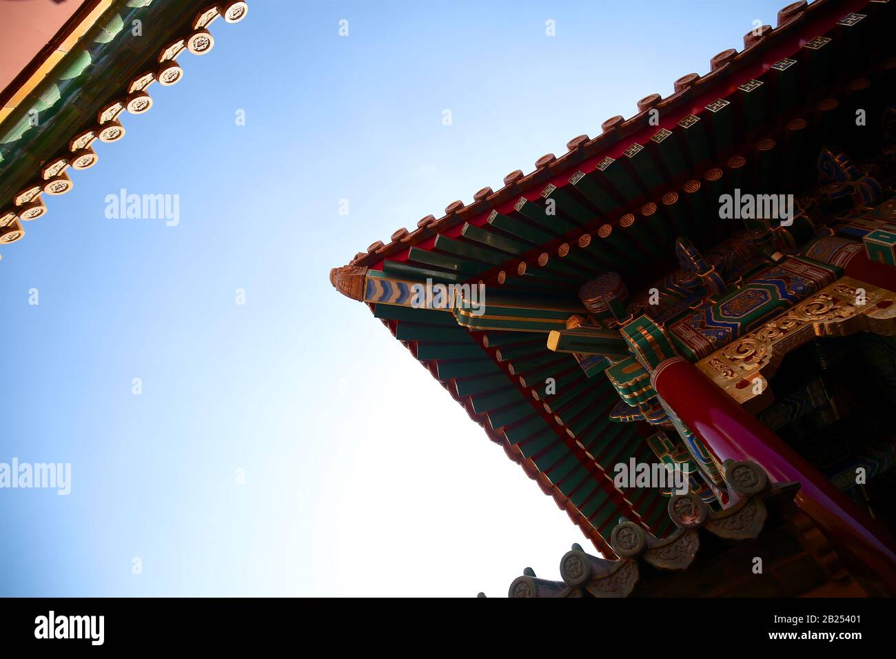 Traditional figures and shape on painted Chinese roof. Chinese ancient architecture. Beijing Stock Photo